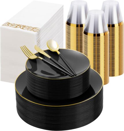 A complete Bestluck 350-piece black and gold disposable dinnerware set arranged for 50 guests, featuring plates, cups, and cu