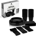 Complete black disposable dinnerware set with plates, cups, napkins, forks, knives, and spoons neatly arranged.