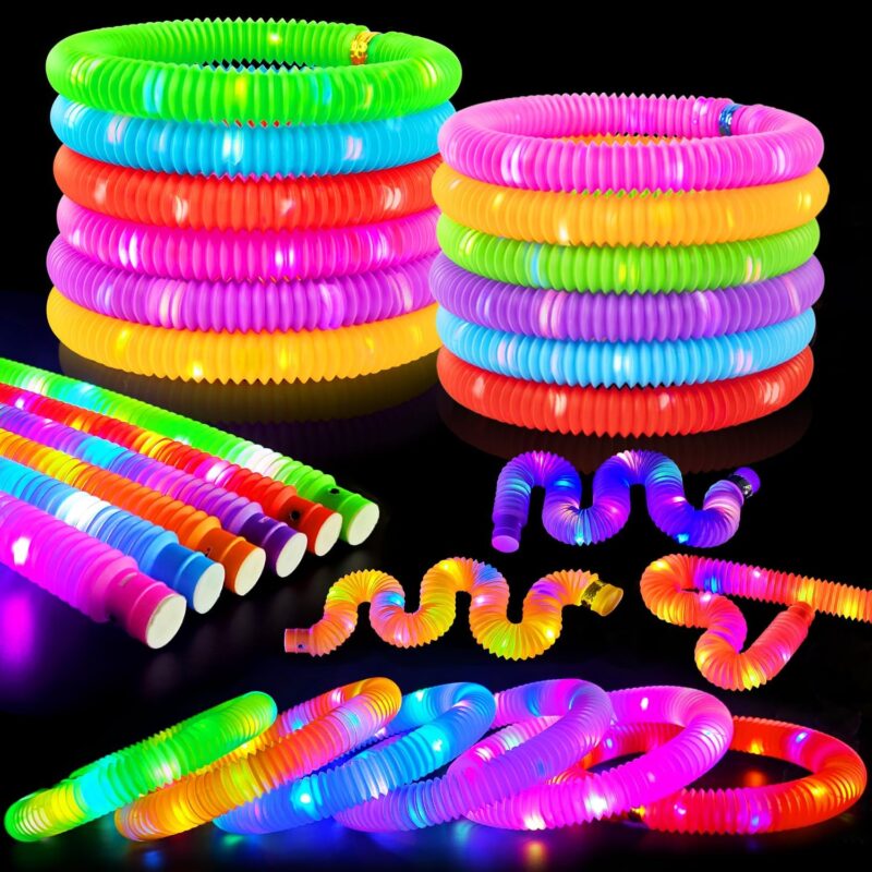 A set of 12 glowing light-up wands in various colors including green, red, blue, pink, orange, and purple.
