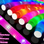 A set of 12 glowing light-up wands in various colors including green, red, blue, pink, orange, and purple.