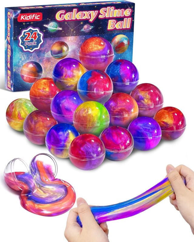 A set of 24 small, multi-colored galaxy slime jars with shimmering textures, packaged together for party favors.