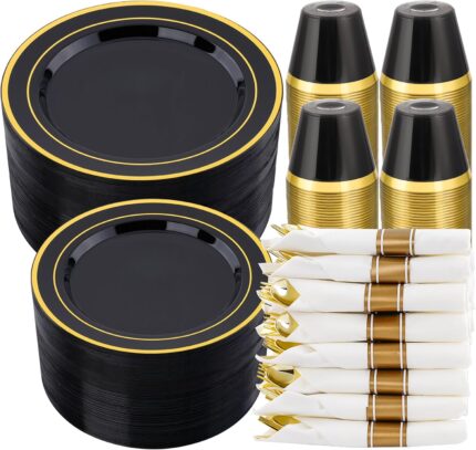 realluck 350-piece black plastic dinnerware set with gold rim plates, gold plastic cutlery, black cups, and white napkins.