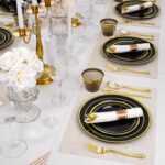 realluck 350-piece black plastic dinnerware set with gold rim plates, gold plastic cutlery, black cups, and white napkins.